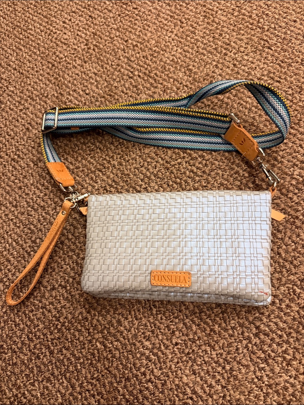 Consuela “Wesley” Iridescent Blue Woven Clutch with Striped Blue-Yellow Strap